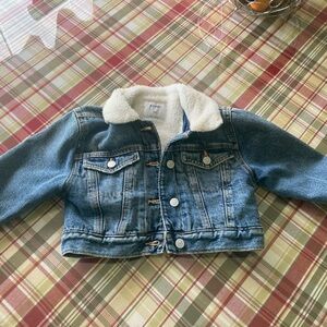 Youth size xs 5t. Denim jacket with fur lining. Never worn